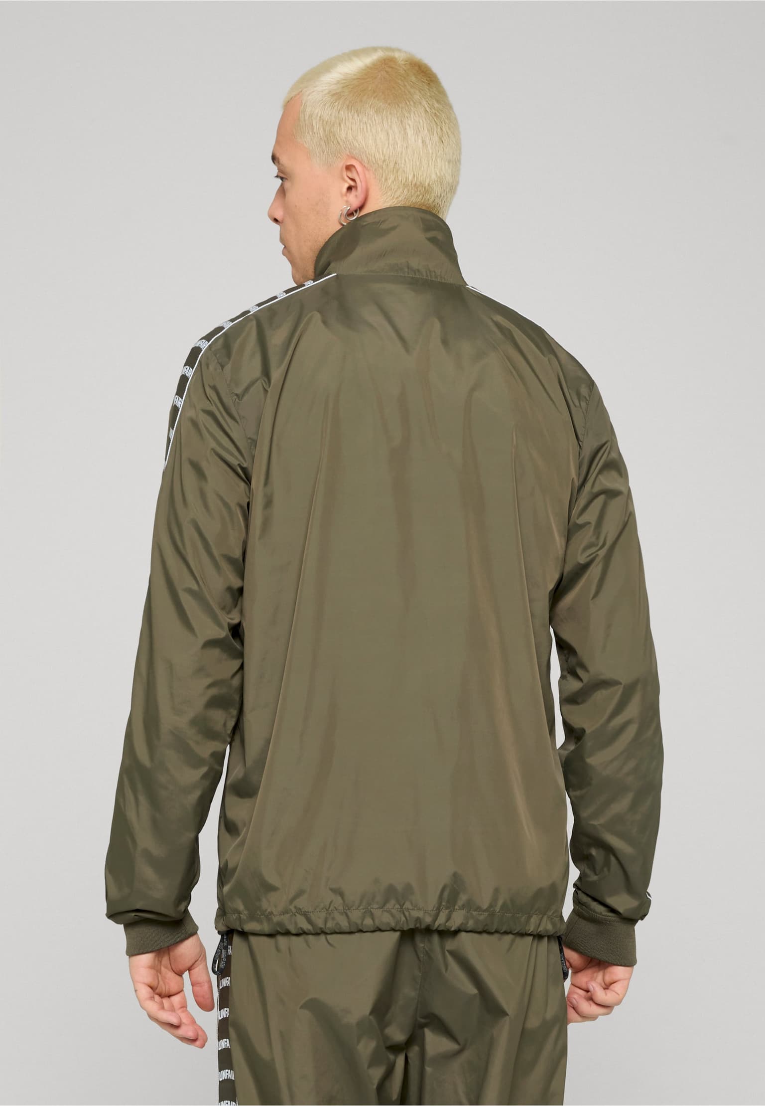 UNFAIR ATHLETICS Curved Tape Tracktop – Bild 2
