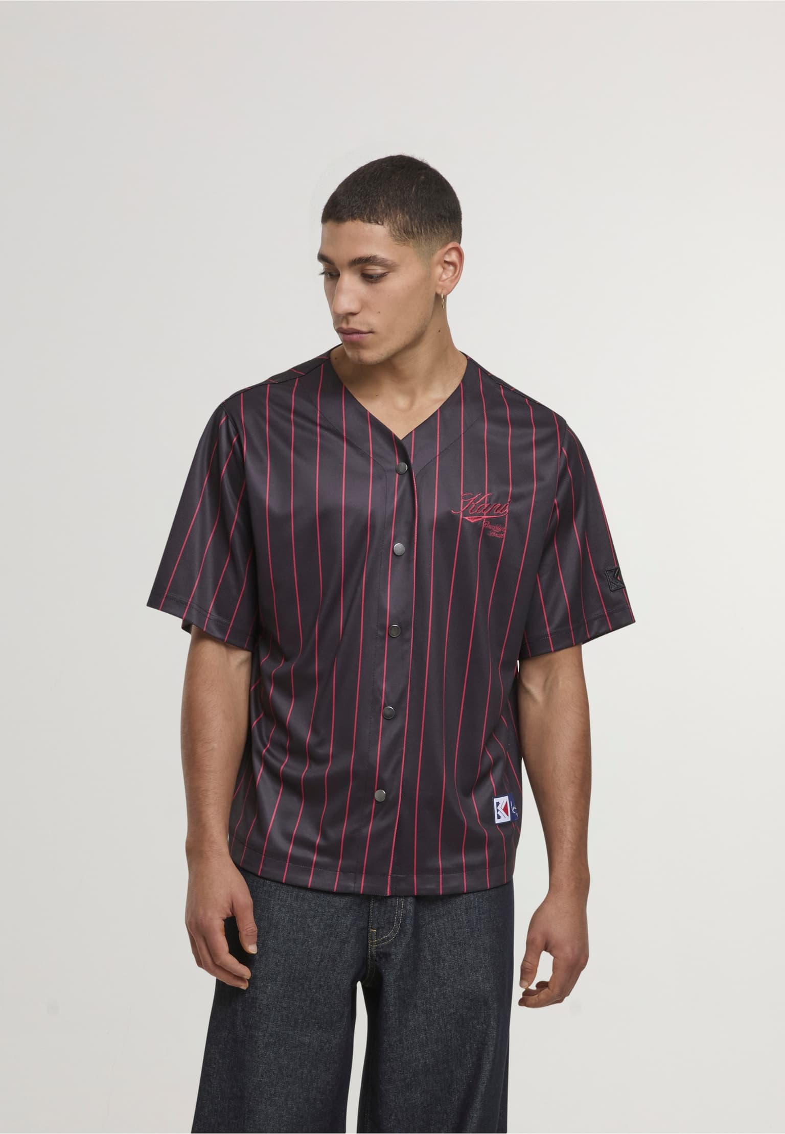 Karl Kani Cursive Varsity Pinstripe Cropped Baseball Jersey